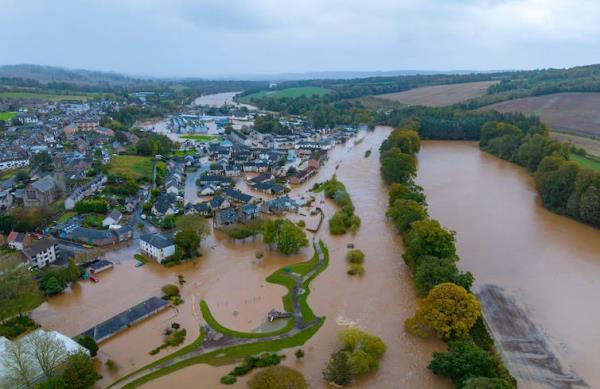 Aerial view of flooded river and town